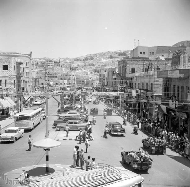 Faisal Square during the passage of the convoy of King Hussein and Jordan’s guest at that time, King Saud - 1957 Amman