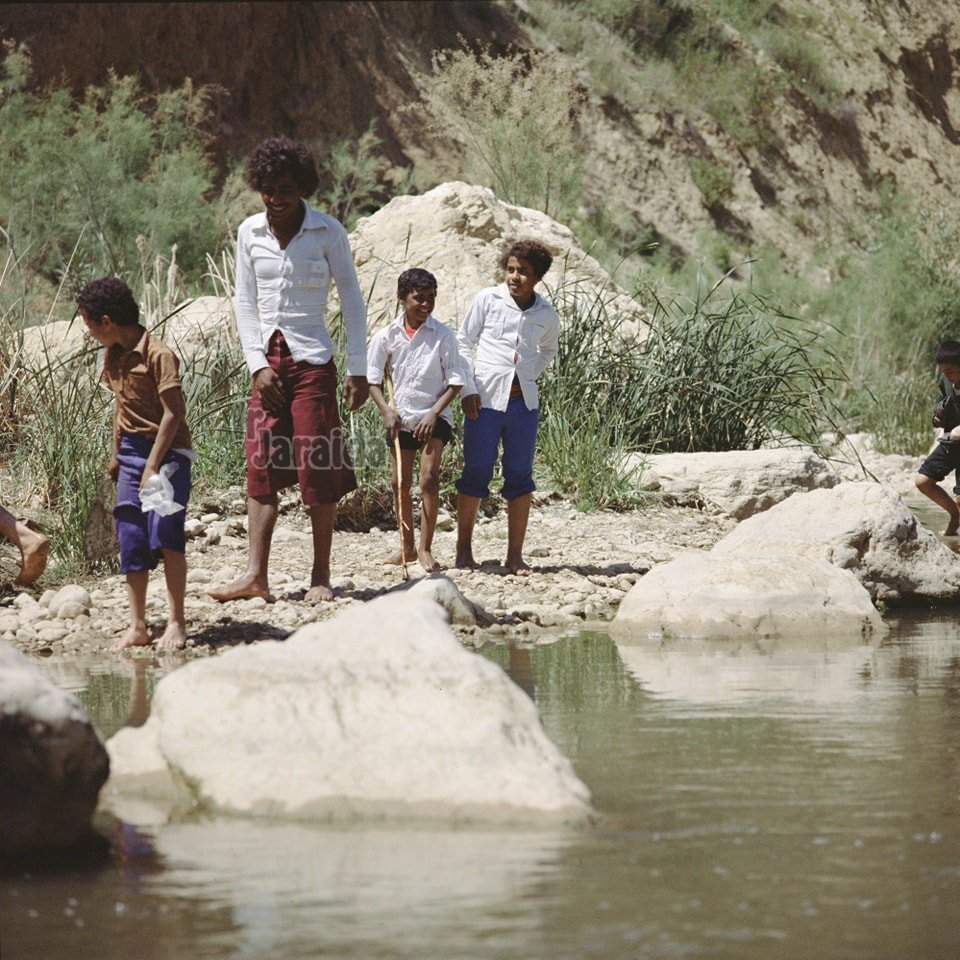 Young men on a trip by the Zarqa River